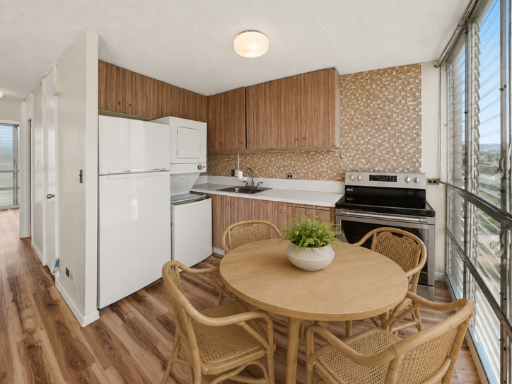Kitchen looking toward laundry and dining area